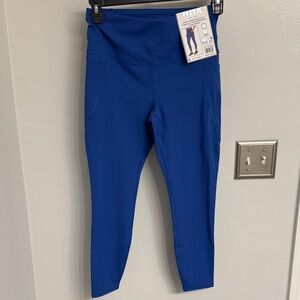 RBX Vibrant Blue Ankle Length Leggings, squat proof with side pockets.